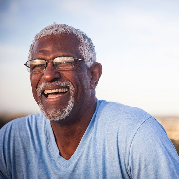 Man smiling outdoors