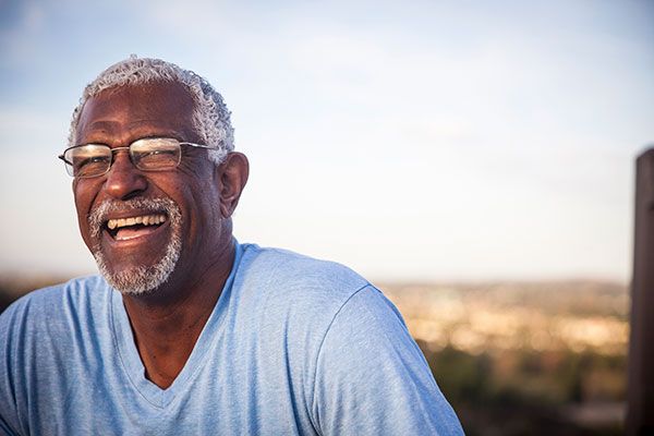 Man smiling outdoors