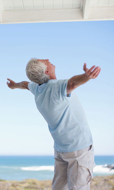 Man embracing ocean