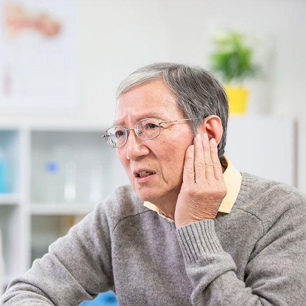 Man describing hearing issue